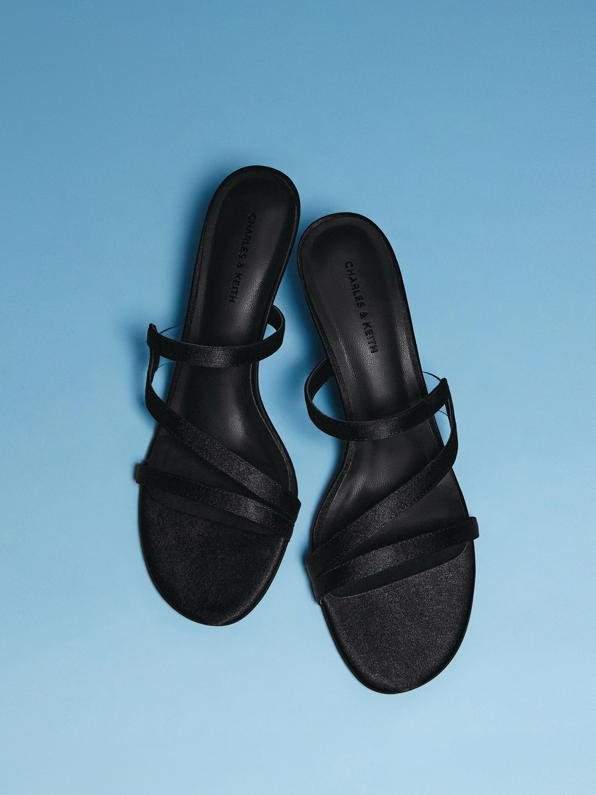 CHARLES & KEITH Customer Favorite | Arden Satin Wavy Heeled Mules - Black Textured