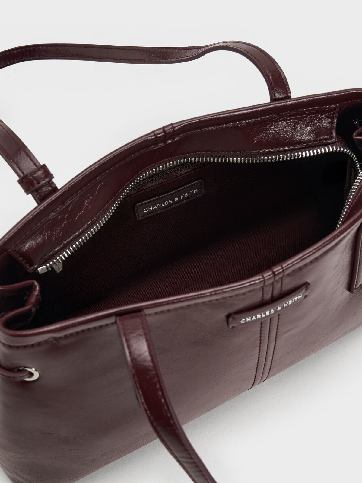 CHARLES & KEITH Customer Favorite | Noane Elongated-Handle Shoulder Bag - Wineberry Red