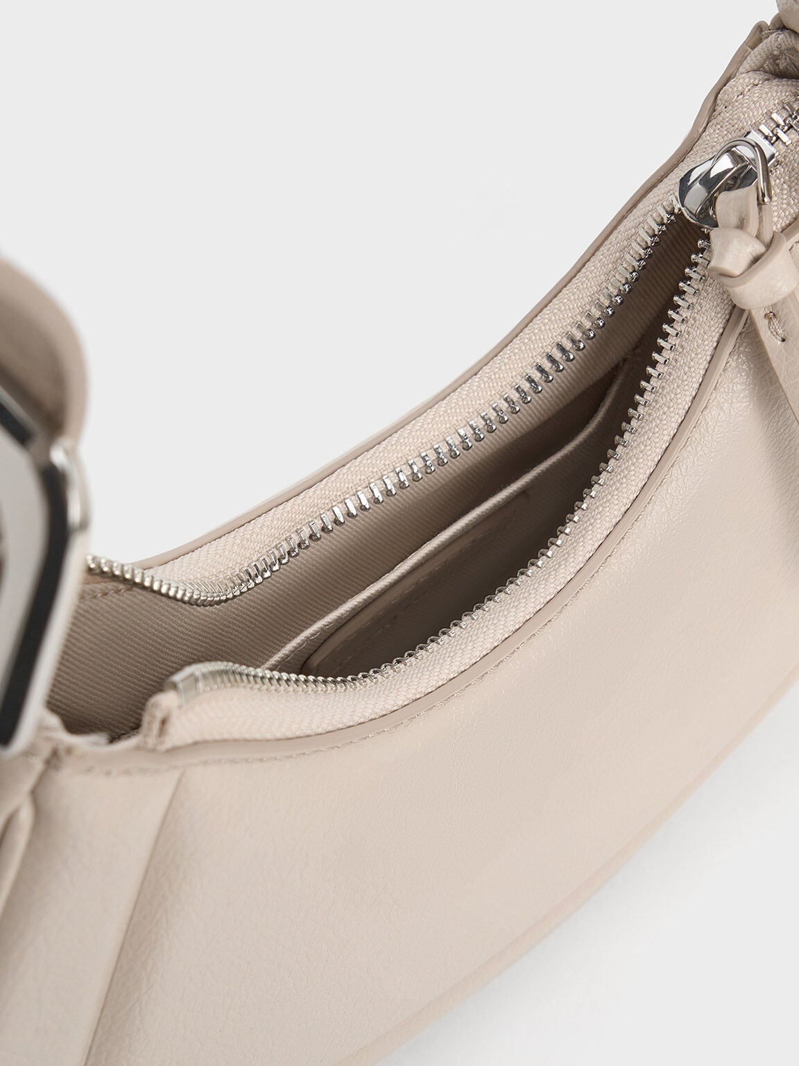 CHARLES & KEITH Recommended | Petra Curved Shoulder Bag - Oat