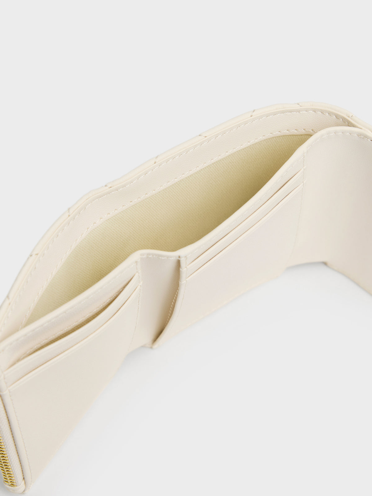 CHARLES & KEITH Classic | Arrietty Quilted Curved-Flap Wallet - Cream