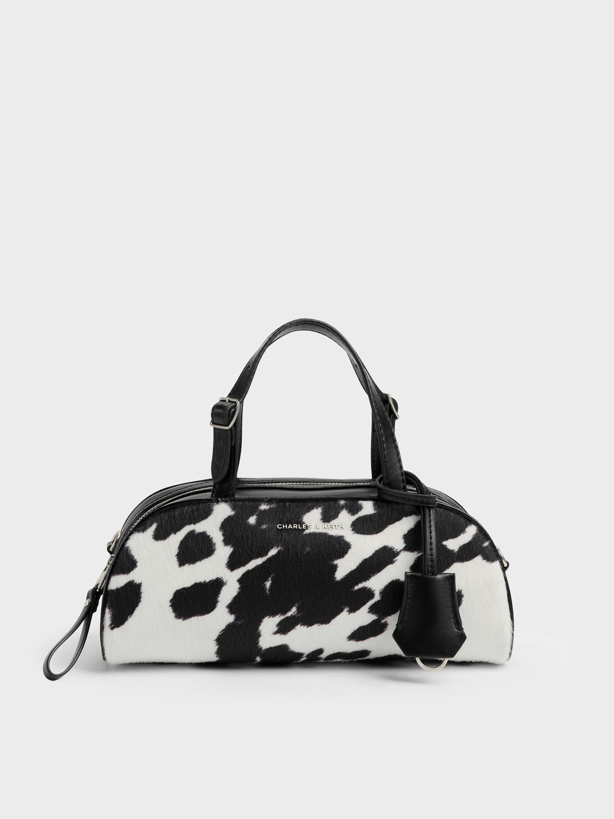 CHARLES & KEITH Recommended | Vega Furry Cow-Print Elongated Bowling Bag - Multi