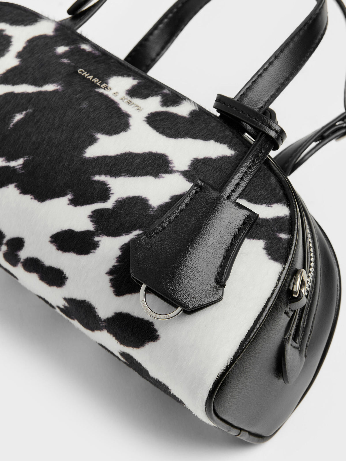 CHARLES & KEITH Recommended | Vega Furry Cow-Print Elongated Bowling Bag - Multi