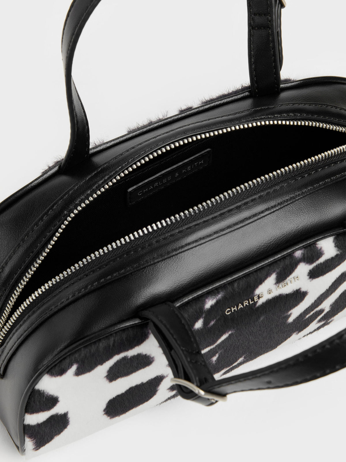 CHARLES & KEITH Recommended | Vega Furry Cow-Print Elongated Bowling Bag - Multi