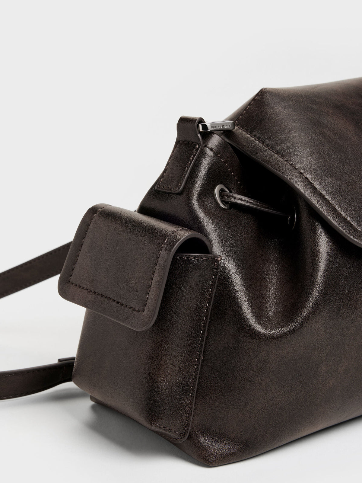 CHARLES & KEITH Deals | Noane Side-Pocket Two-Way Bucket Bag - Dark Brown