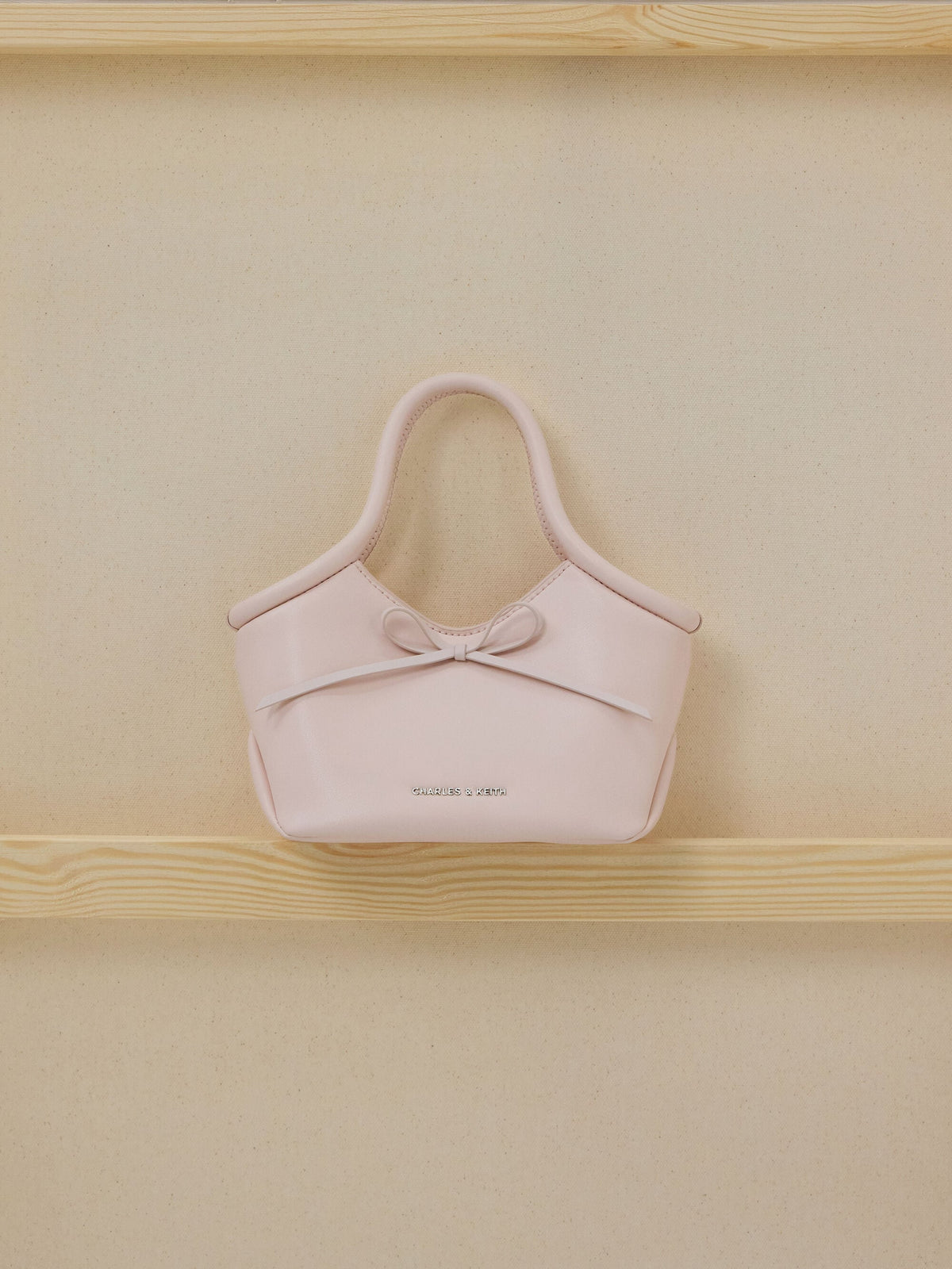 CHARLES & KEITH Best Price | Hazel Bow Tubular Top Handle Bag - Soft Pink