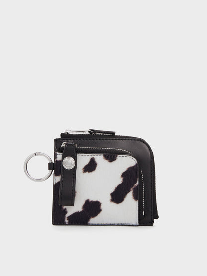 CHARLES & KEITH Popular | Vega Furry Cow-Print Zip-Around Pouch - Multi