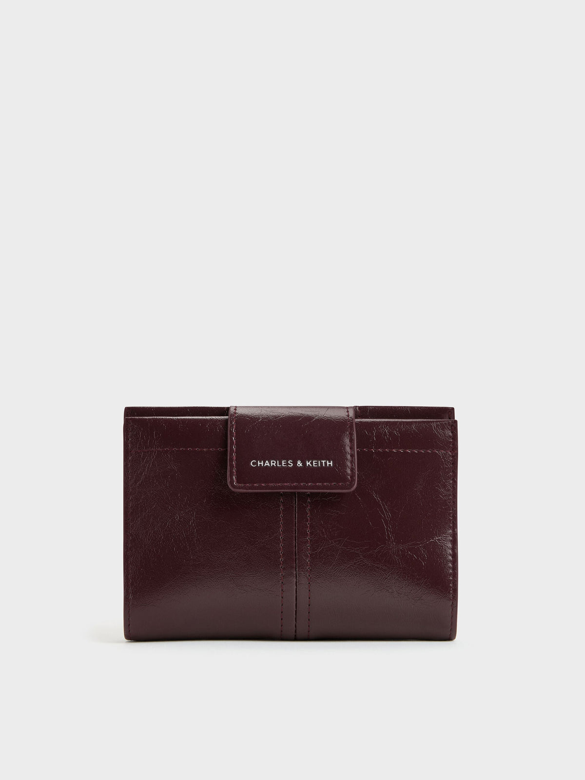 CHARLES & KEITH Top Pick | Noane Passport Holder - Wineberry Red