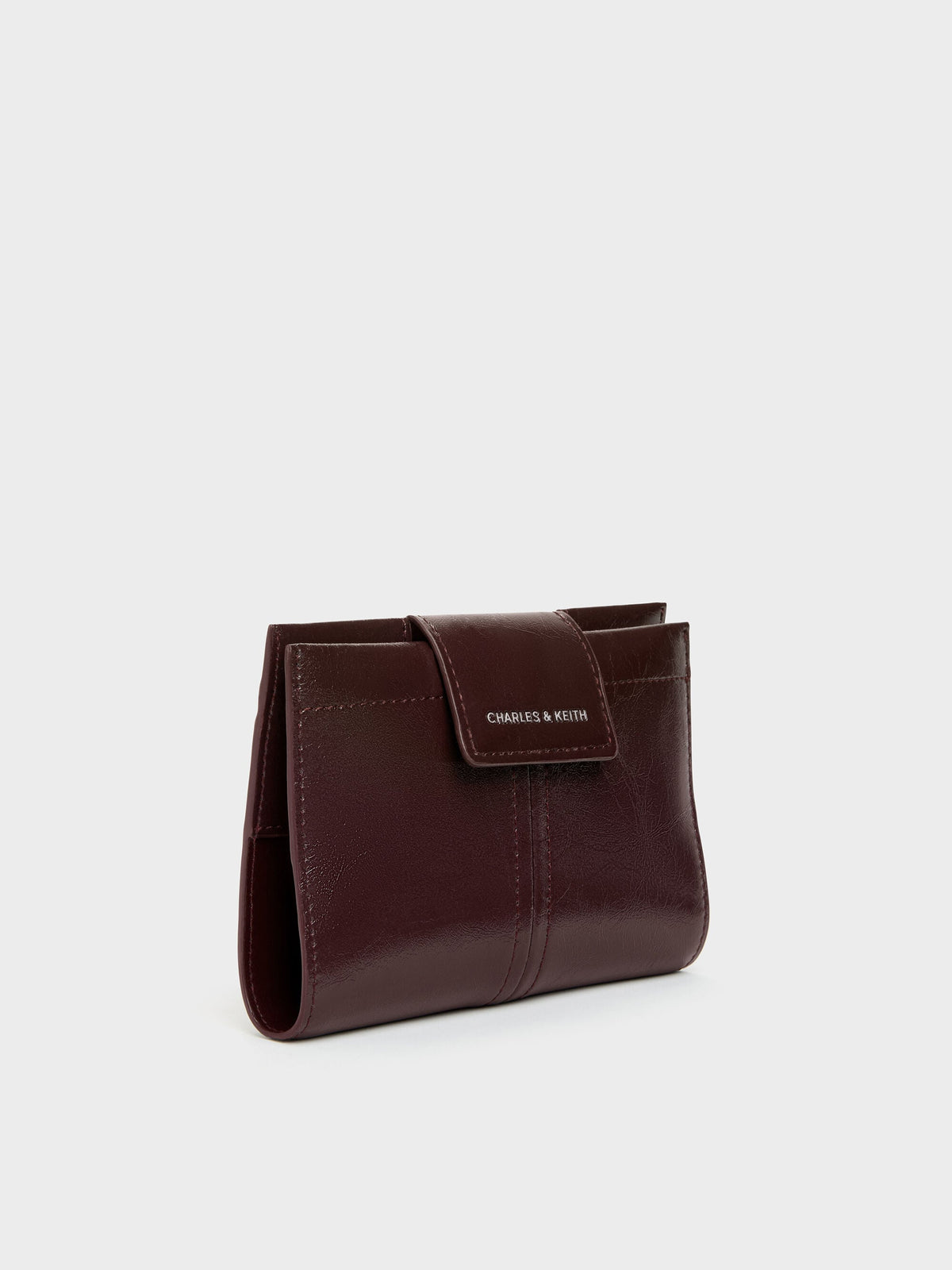 CHARLES & KEITH Top Pick | Noane Passport Holder - Wineberry Red