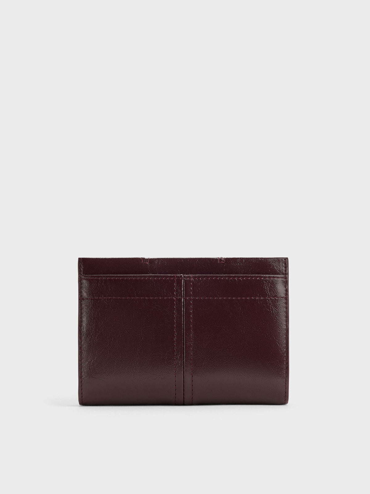 CHARLES & KEITH Top Pick | Noane Passport Holder - Wineberry Red