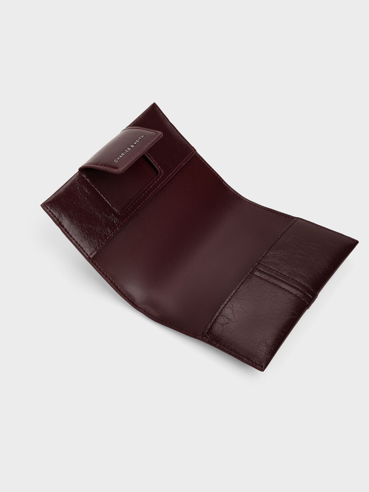 CHARLES & KEITH Top Pick | Noane Passport Holder - Wineberry Red