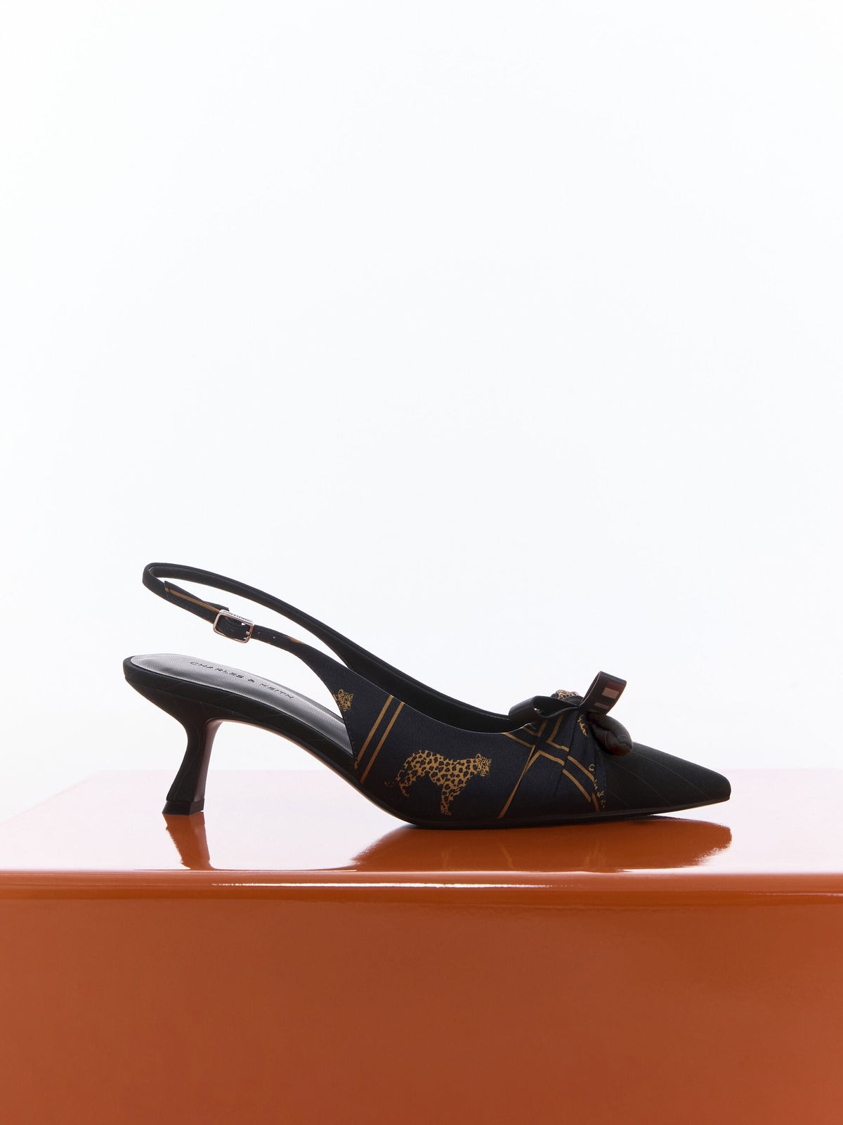 CHARLES & KEITH Trusted | Satin Printed-Bow Pointed Slingback Pumps - Black Textured