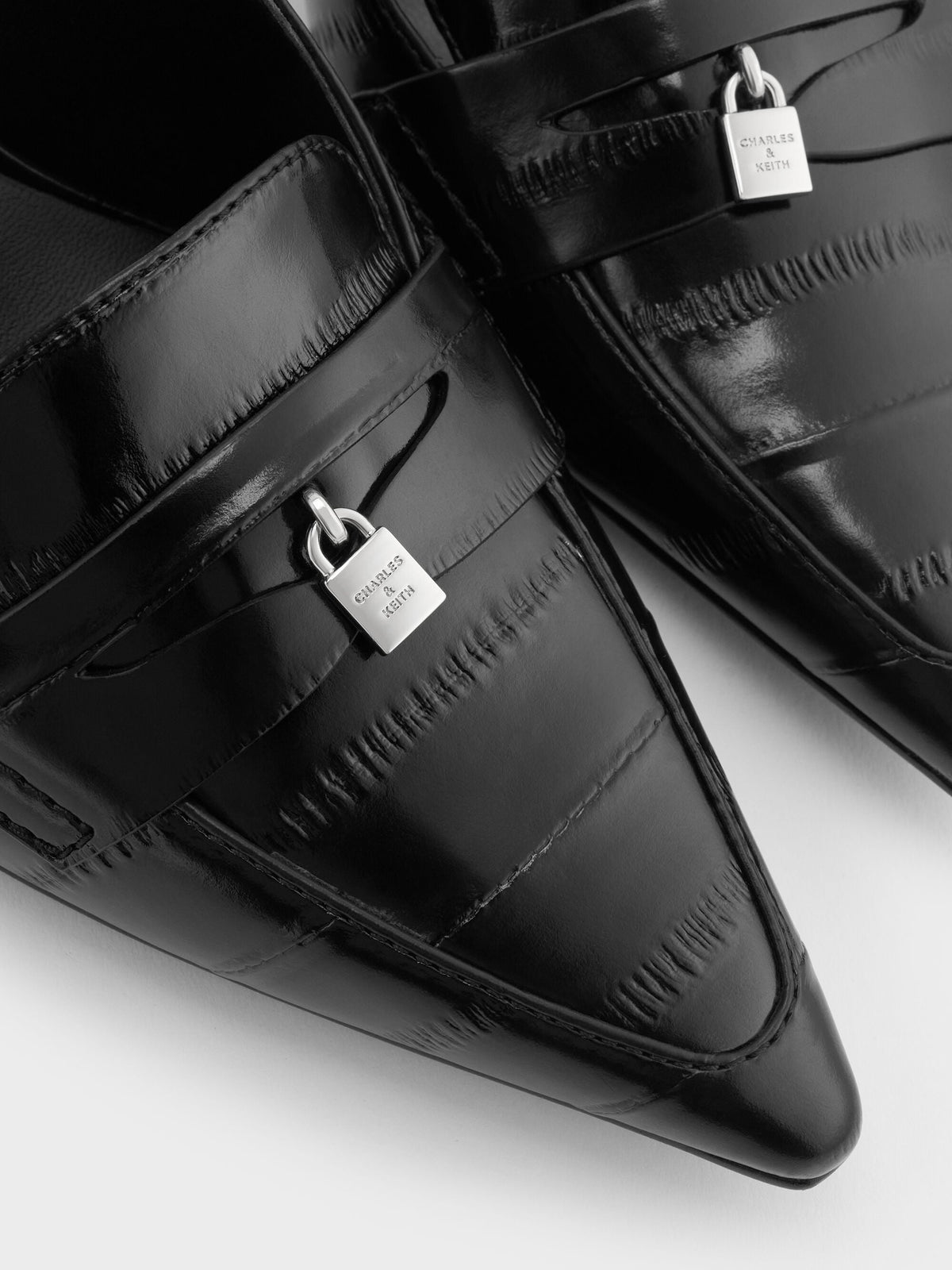 CHARLES & KEITH Deals | Griselda Eel-Effect Slingback Pumps - Animal Print Black