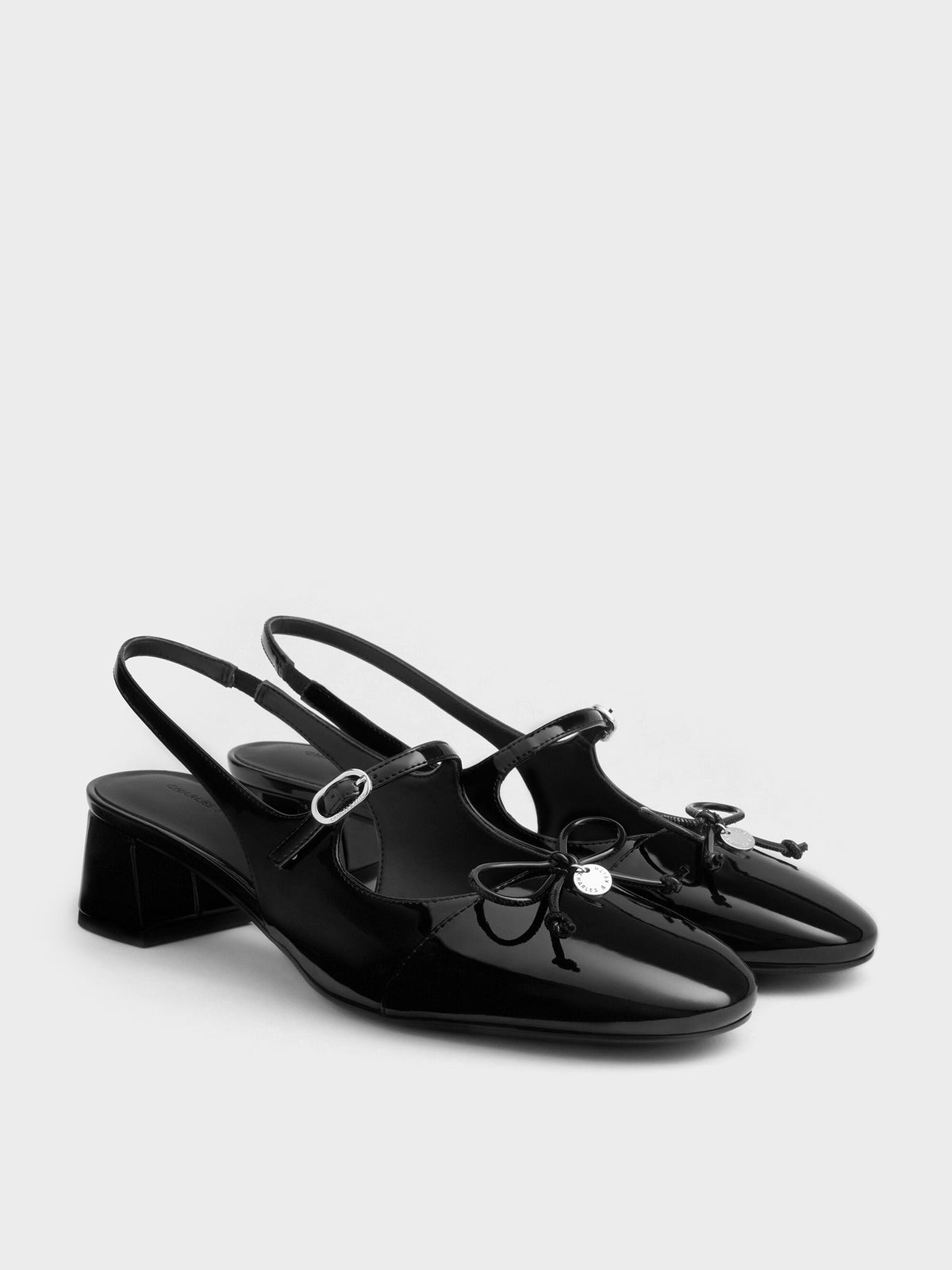 CHARLES & KEITH Top Pick | Patent Bow Slingback Pumps - Black Patent