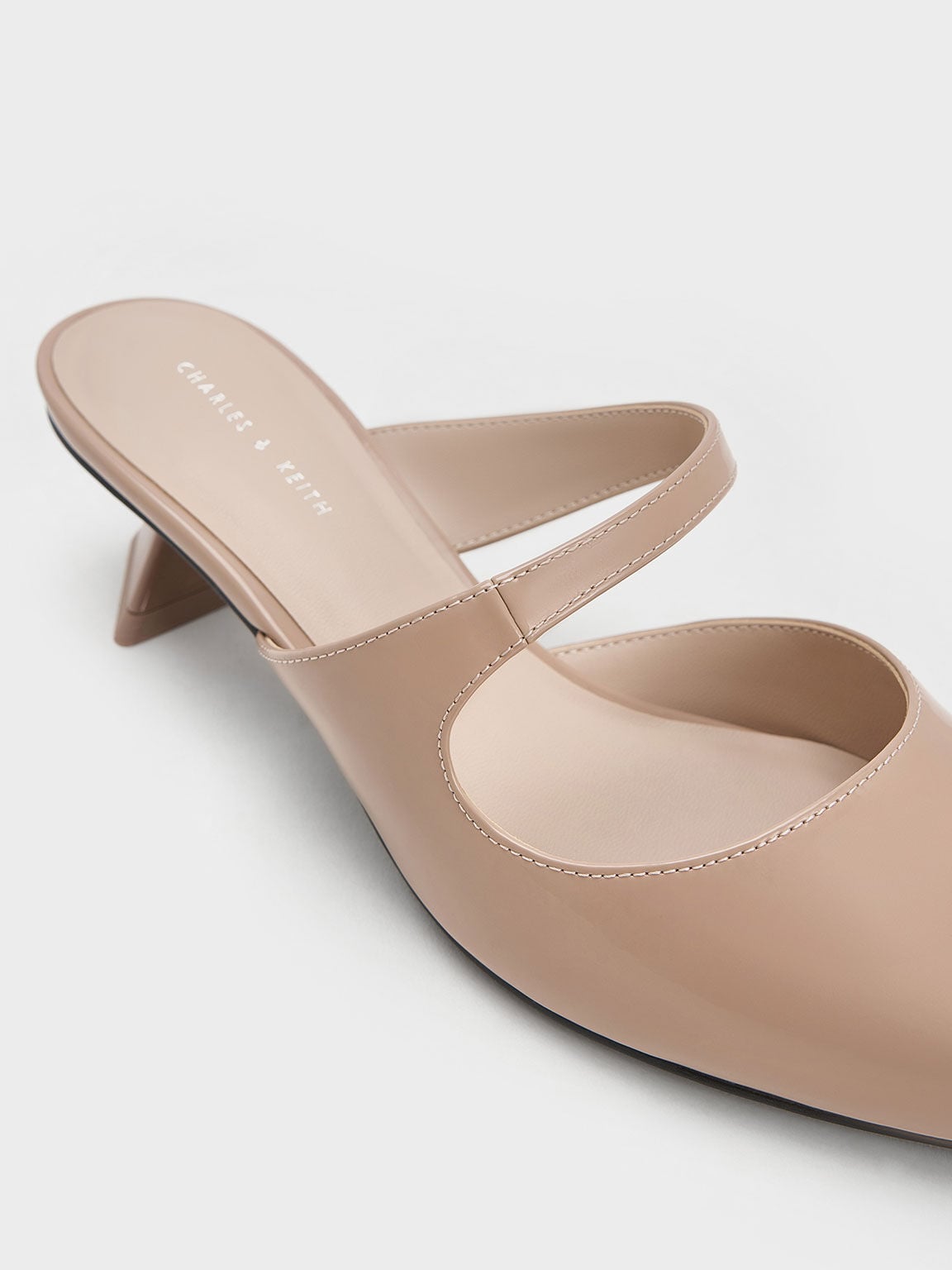 CHARLES & KEITH Signature | Vada Patent Asymmetric Sculptural Heel Pumps - Nude
