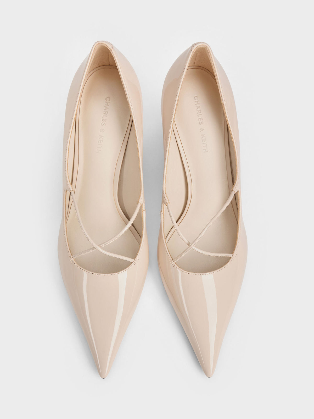 CHARLES & KEITH Signature | Patent Crossover Pointed Pumps - Nude