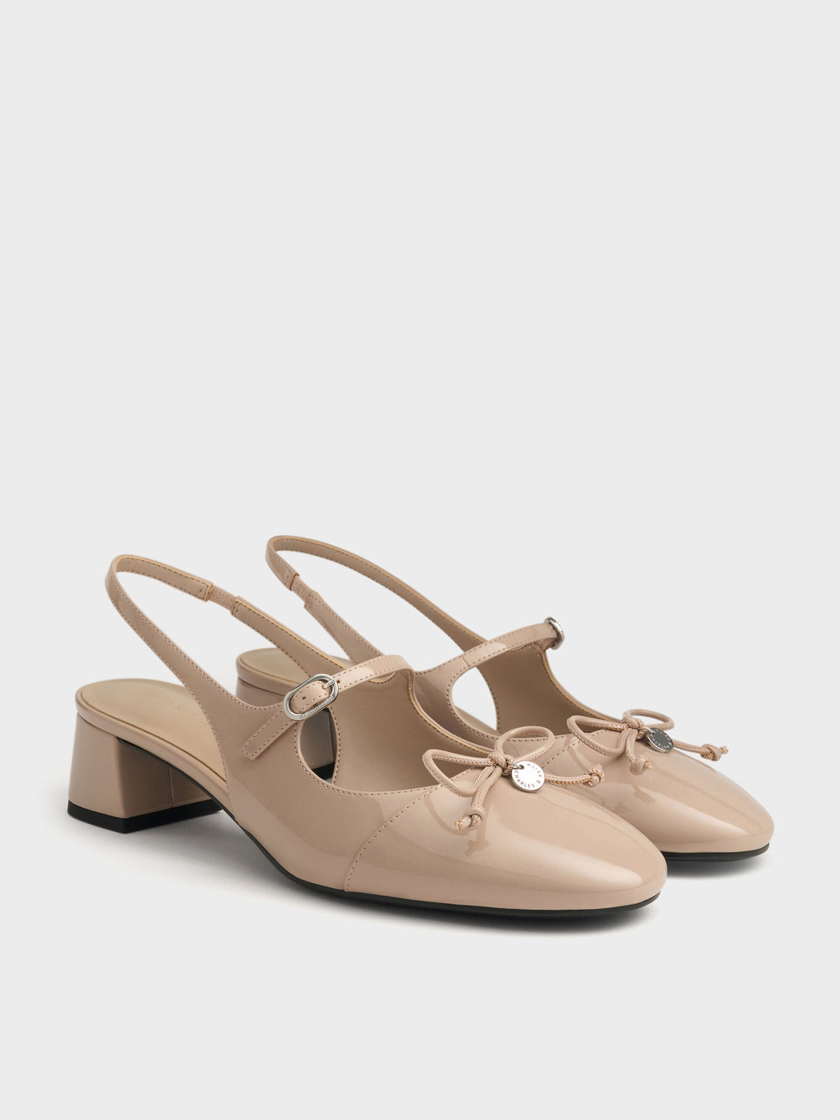CHARLES & KEITH Featured | Patent Bow Slingback Pumps - Nude