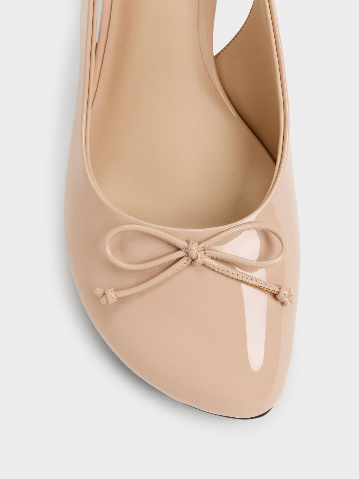 CHARLES & KEITH Top Pick | Imani Patent Asymmetric Slingback Pumps - Nude