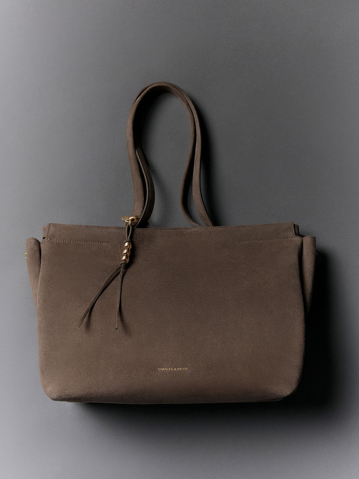 CHARLES & KEITH Popular | XL Zephyr Tassel Tote Bag - Stone Grey