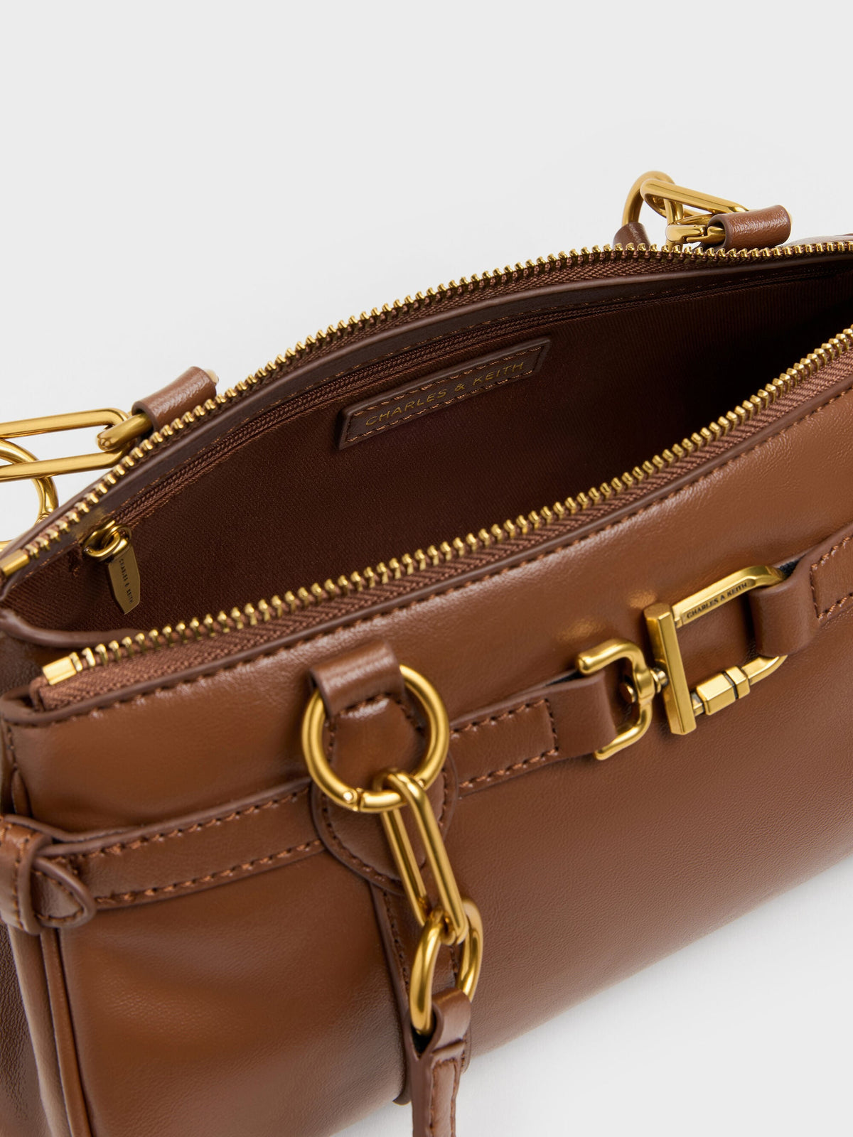 CHARLES & KEITH Latest | Gwynne Metallic-Accent Elongated Shoulder Bag - Chocolate