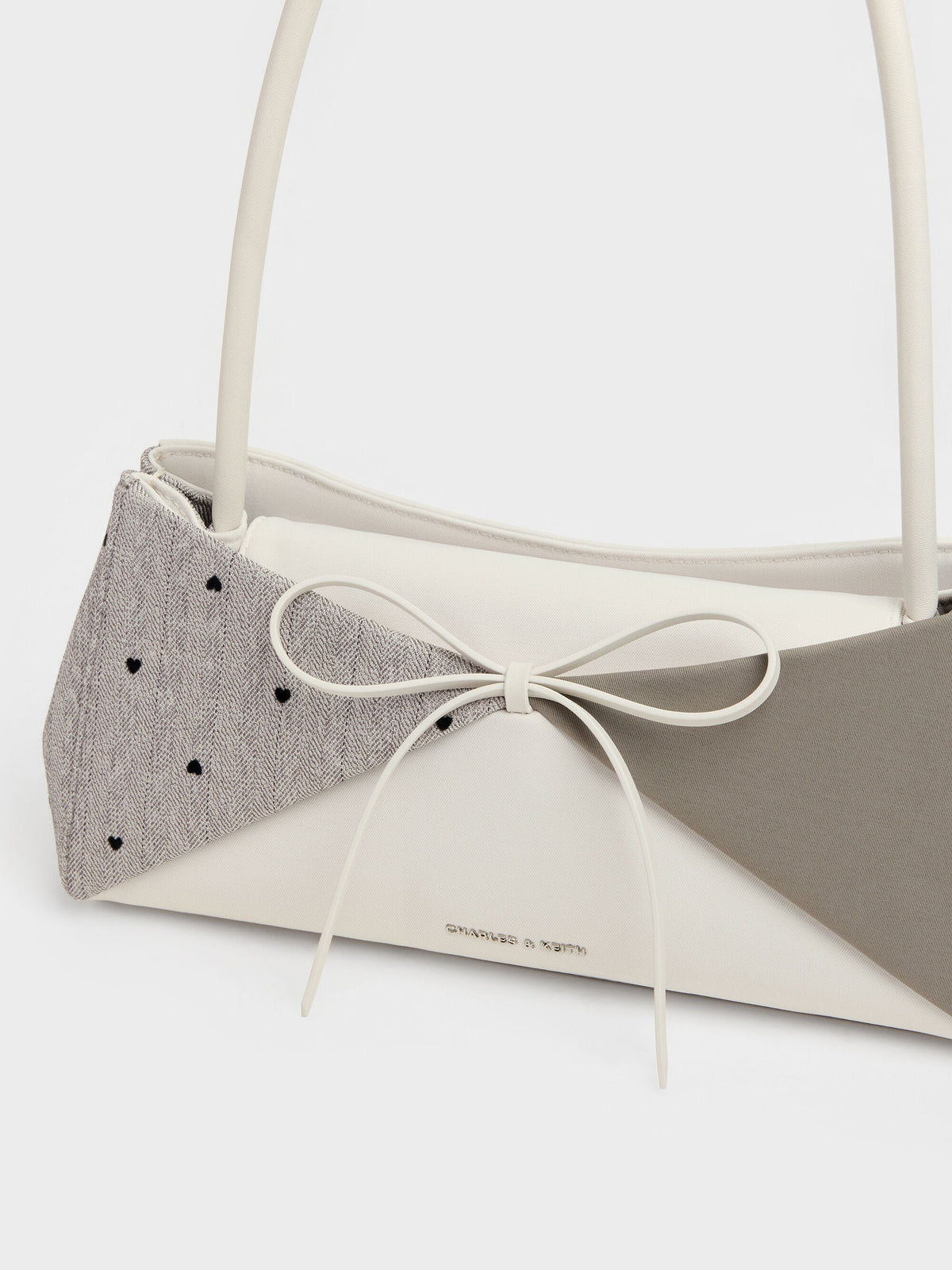 CHARLES & KEITH Latest | Hazel Heart-Print Bow Panelled Shoulder Bag - Taupe