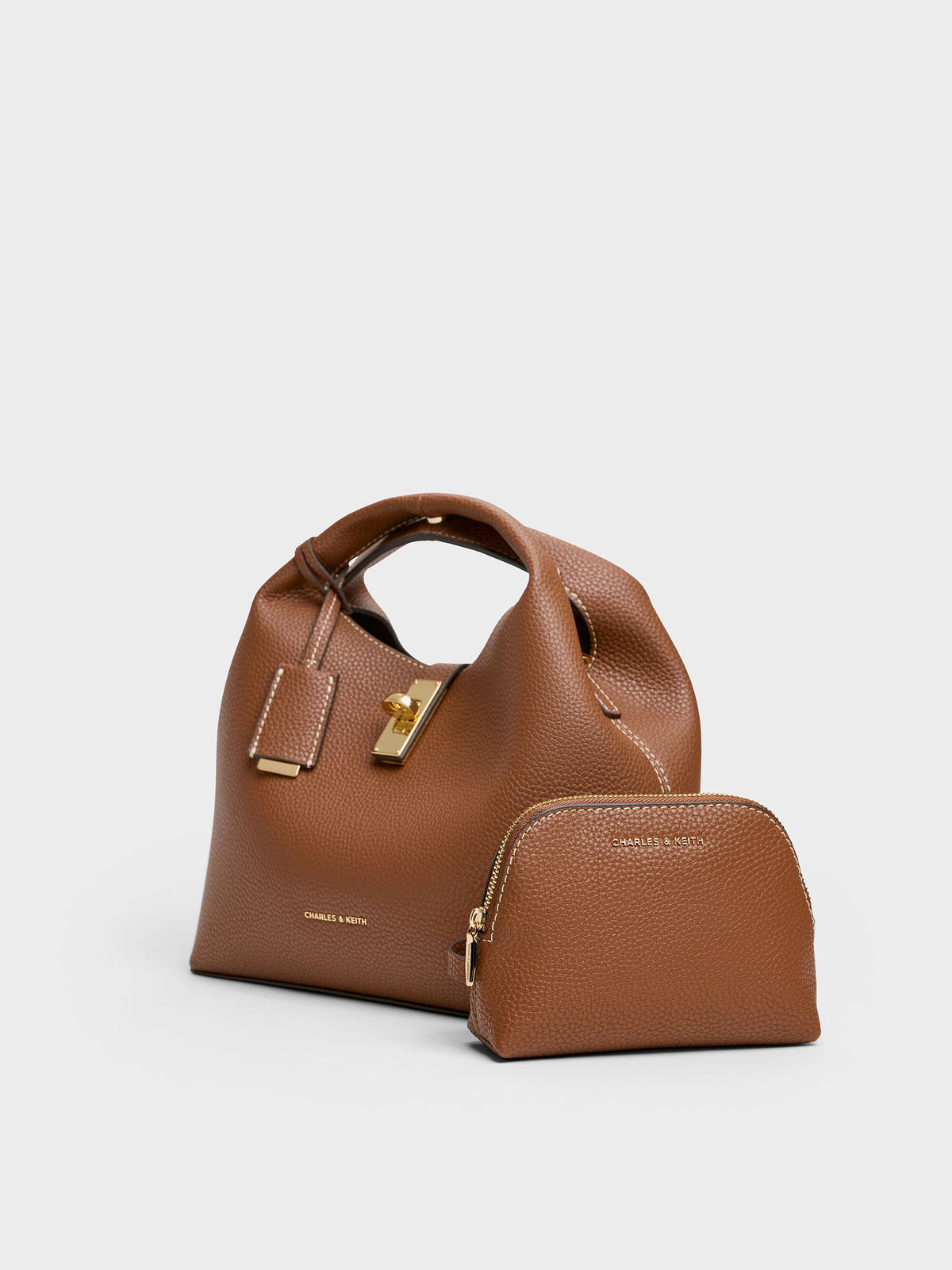 CHARLES & KEITH Premium | Chance Turn-Lock Bucket Bag - Chocolate