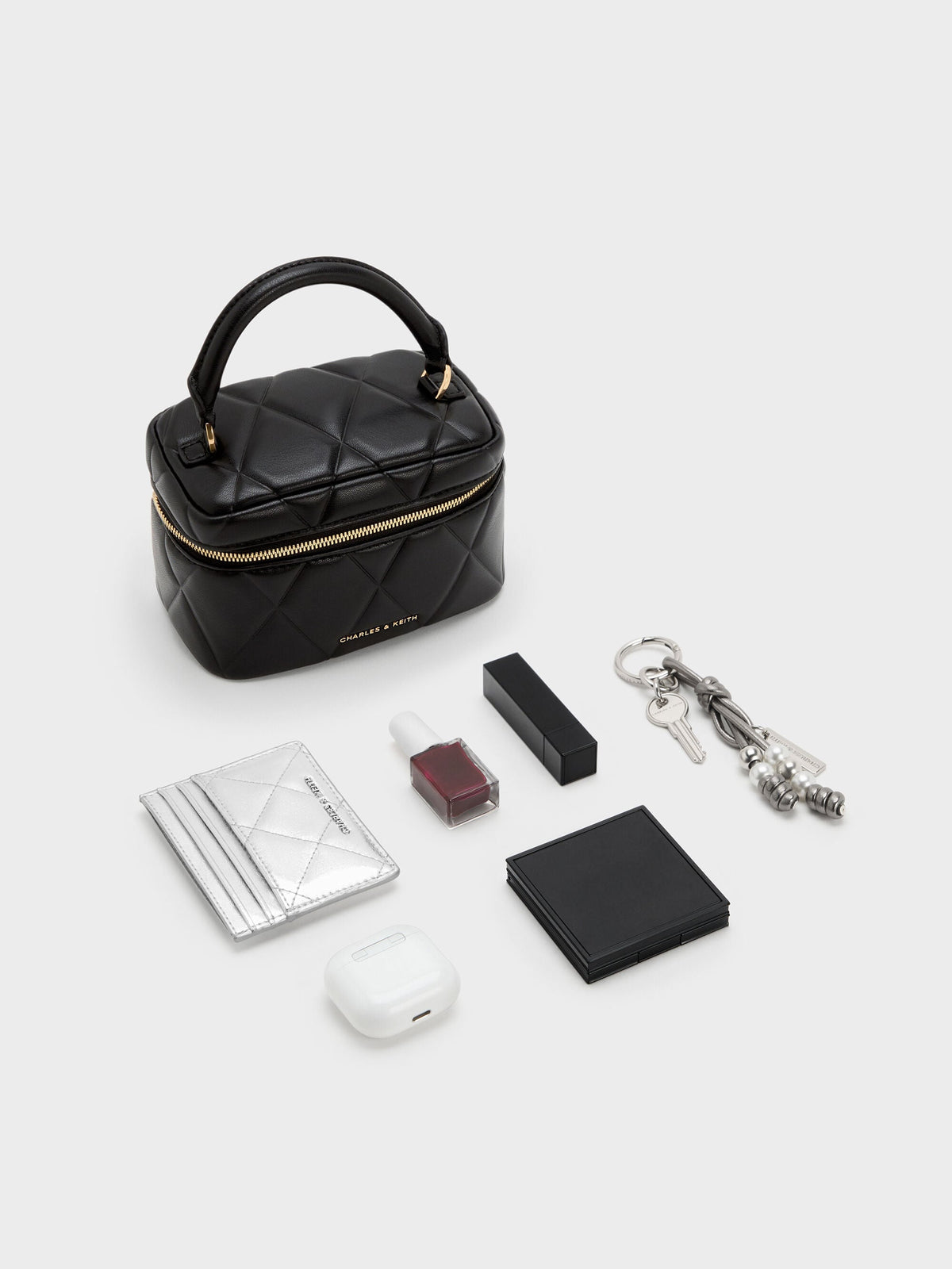 CHARLES & KEITH Sale | Arwen Quilted Top Handle Vanity Bag - Black
