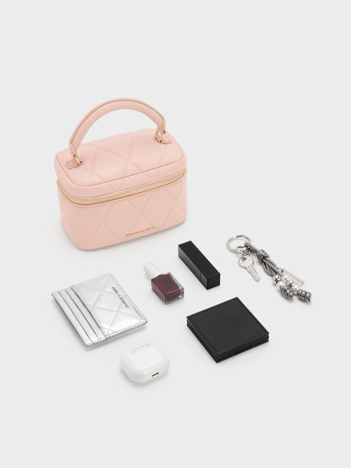 CHARLES & KEITH Top Pick | Arwen Quilted Top Handle Vanity Bag - Light Pink