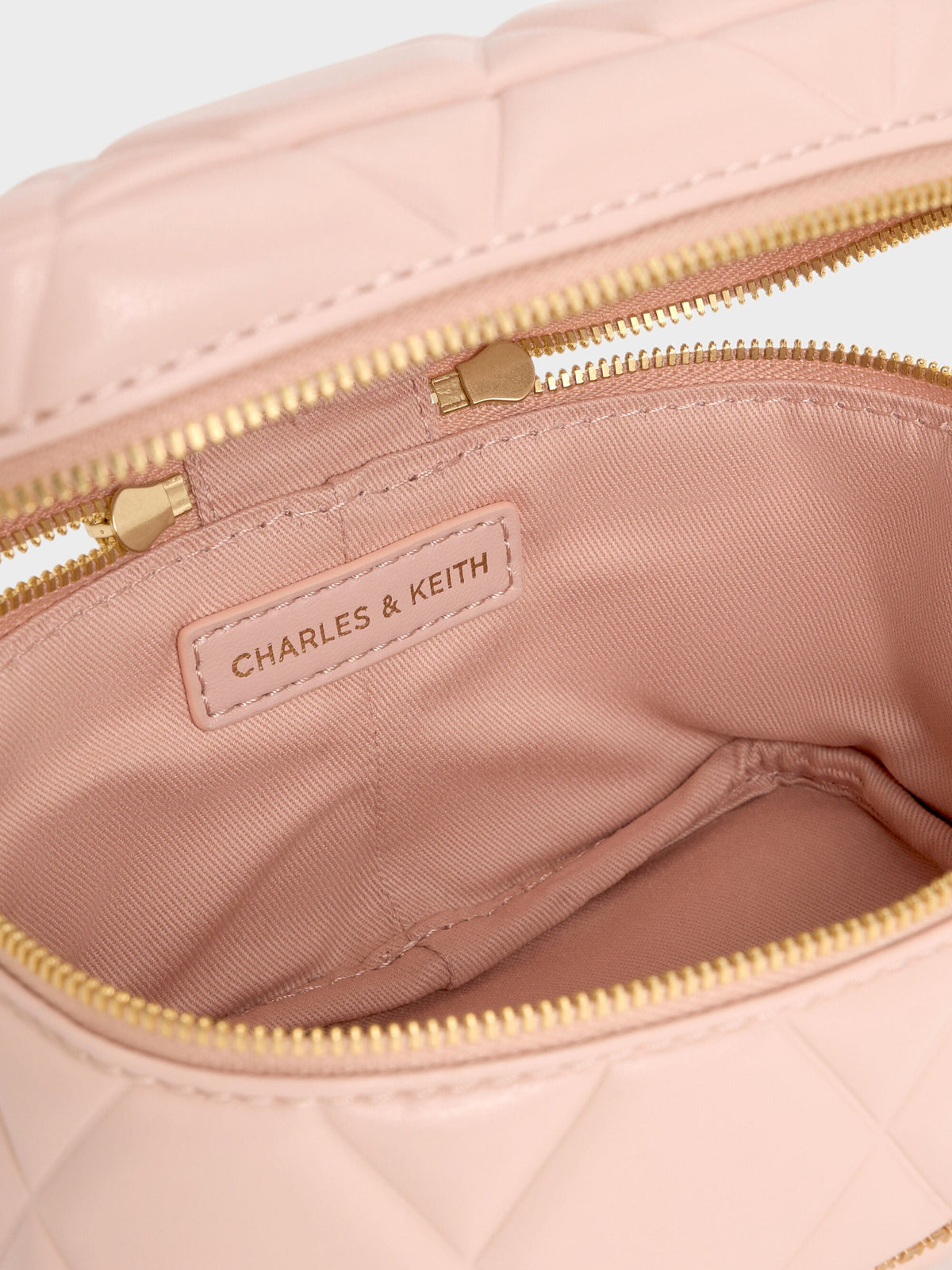 CHARLES & KEITH Top Pick | Arwen Quilted Top Handle Vanity Bag - Light Pink