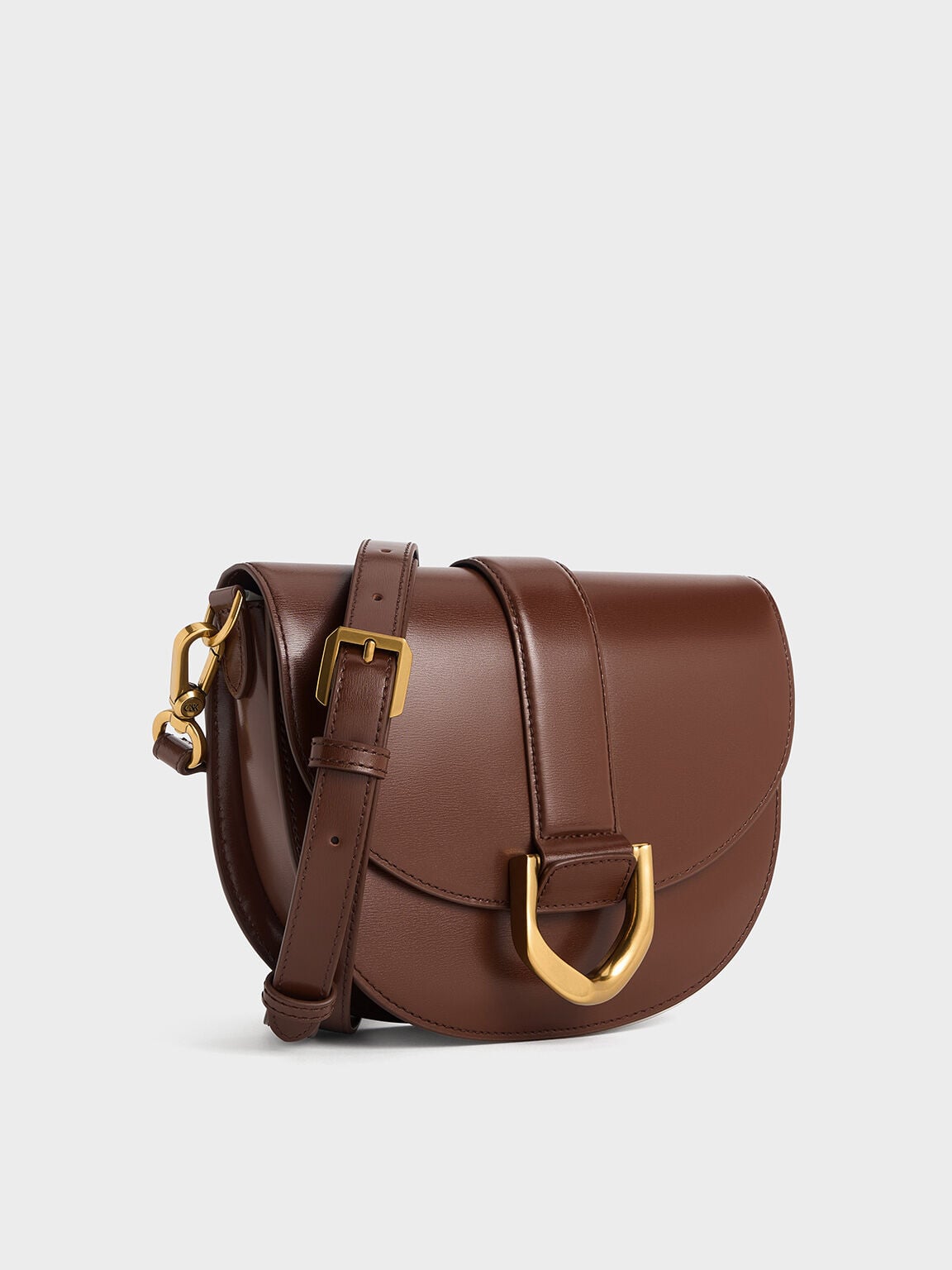 CHARLES & KEITH Essential | Gabine Leather Saddle Bag - Dark Brown