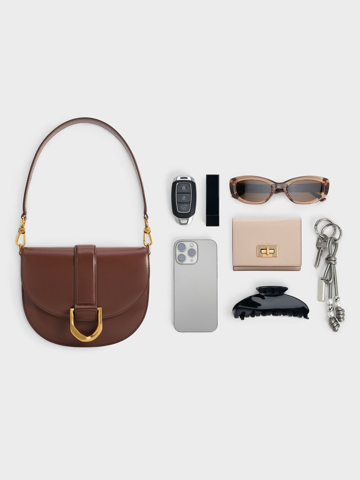 CHARLES & KEITH Essential | Gabine Leather Saddle Bag - Dark Brown