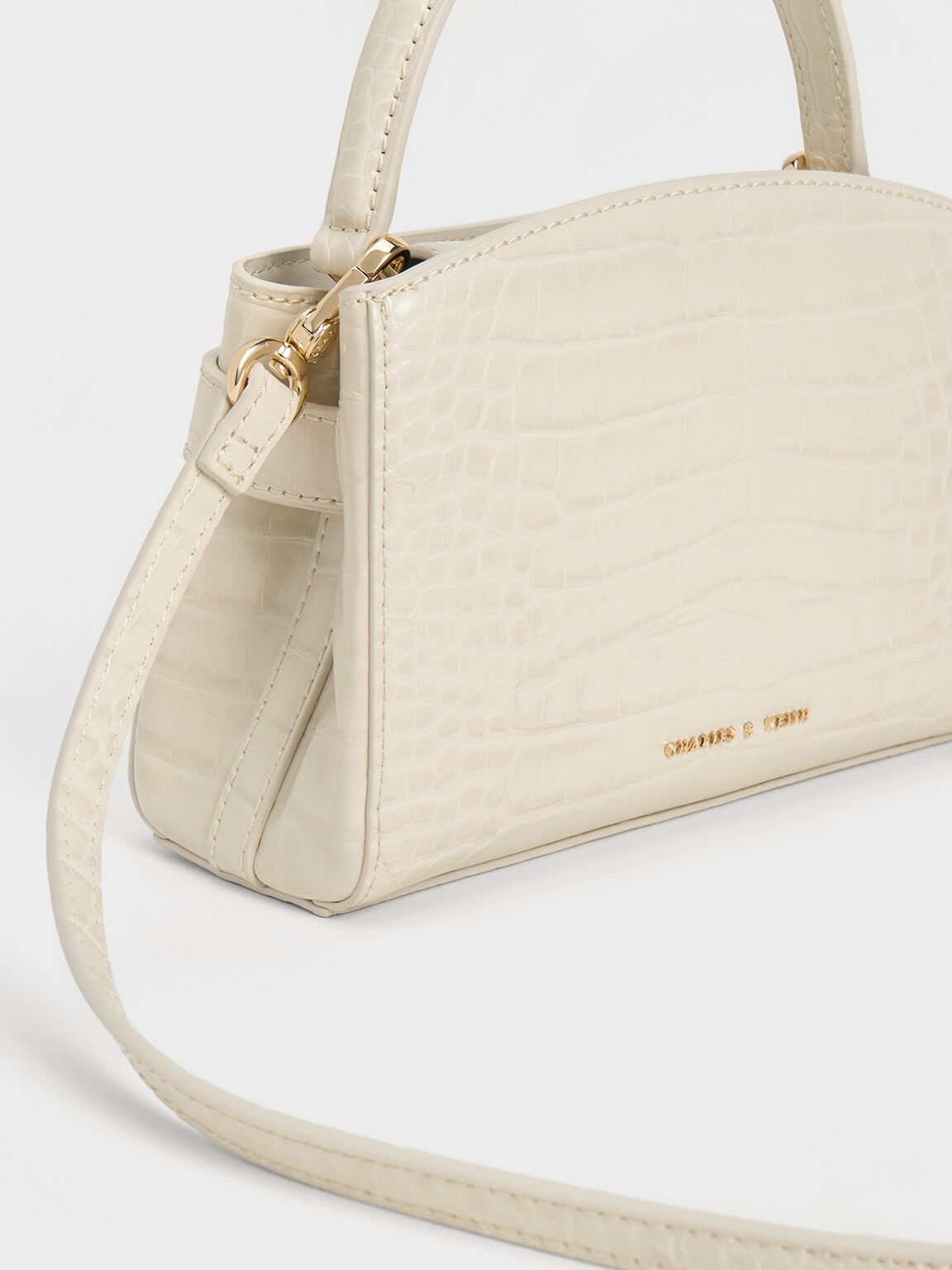 CHARLES & KEITH Popular | Aubrielle Croc-Effect Belted Top Handle Bag - Ivory