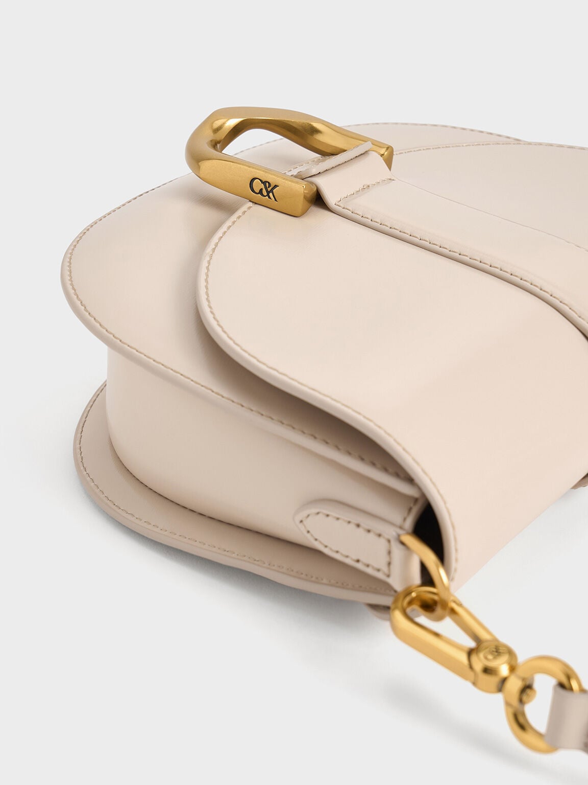 CHARLES & KEITH Premium | Gabine Leather Saddle Bag - Oat