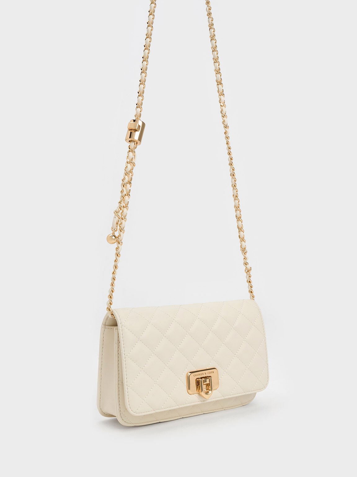 CHARLES & KEITH Top Pick | Cressida Quilted Push-Lock Clutch - Cream