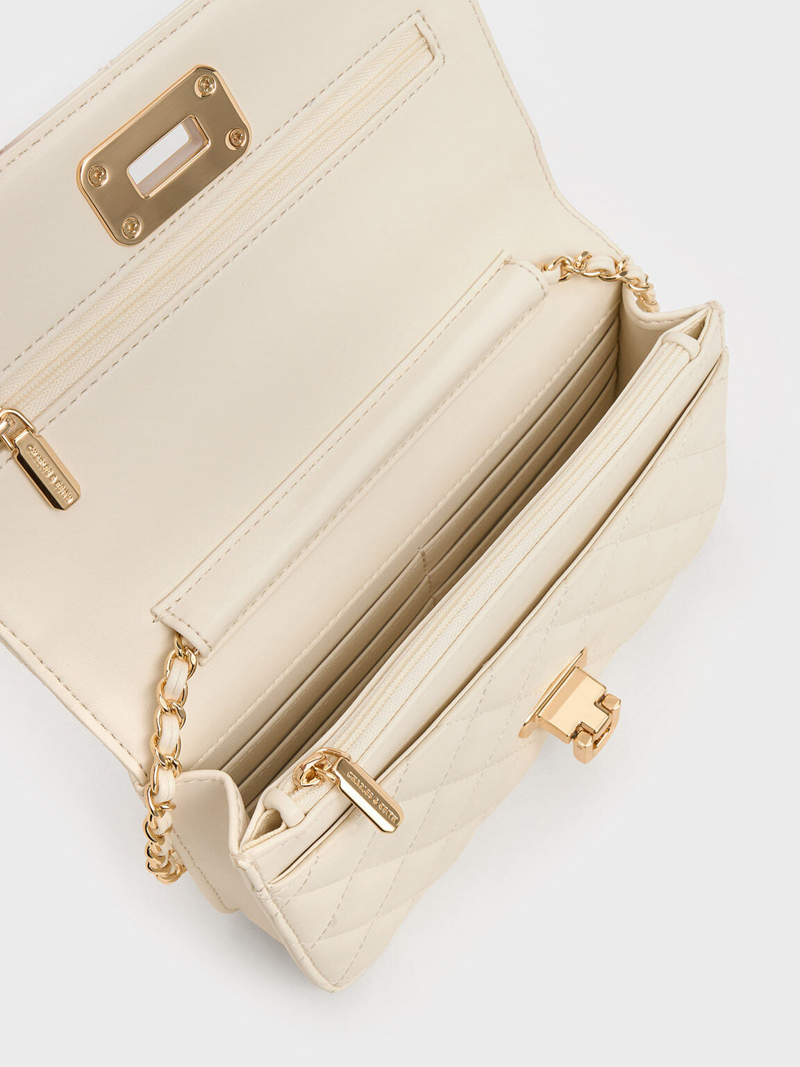 CHARLES & KEITH Top Pick | Cressida Quilted Push-Lock Clutch - Cream