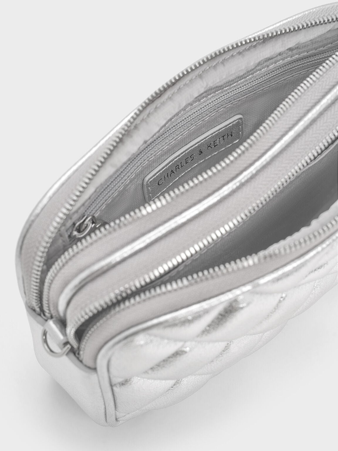 CHARLES & KEITH Featured | Mini Apfra Quilted Crossbody Bag - Silver