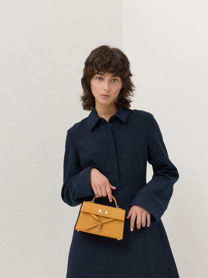 CHARLES & KEITH Signature | Tricha Knotted-Belt Top Handle Bag - Saffron Yellow