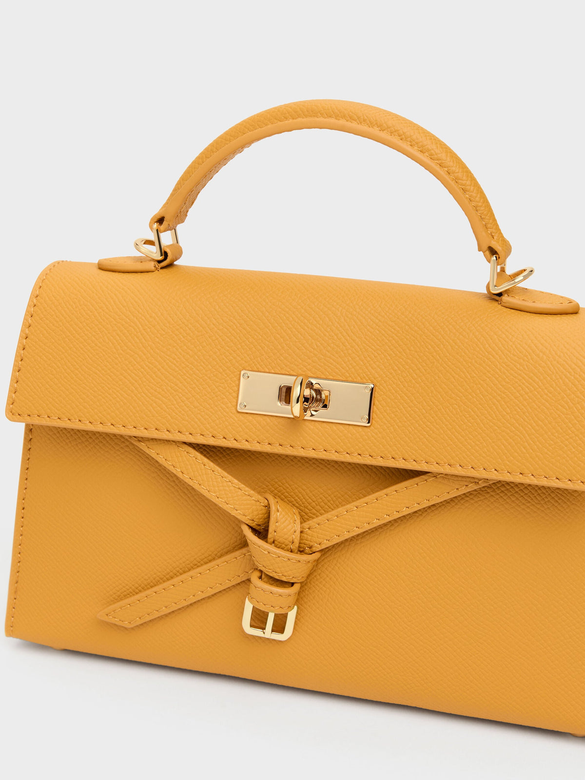 CHARLES & KEITH Signature | Tricha Knotted-Belt Top Handle Bag - Saffron Yellow