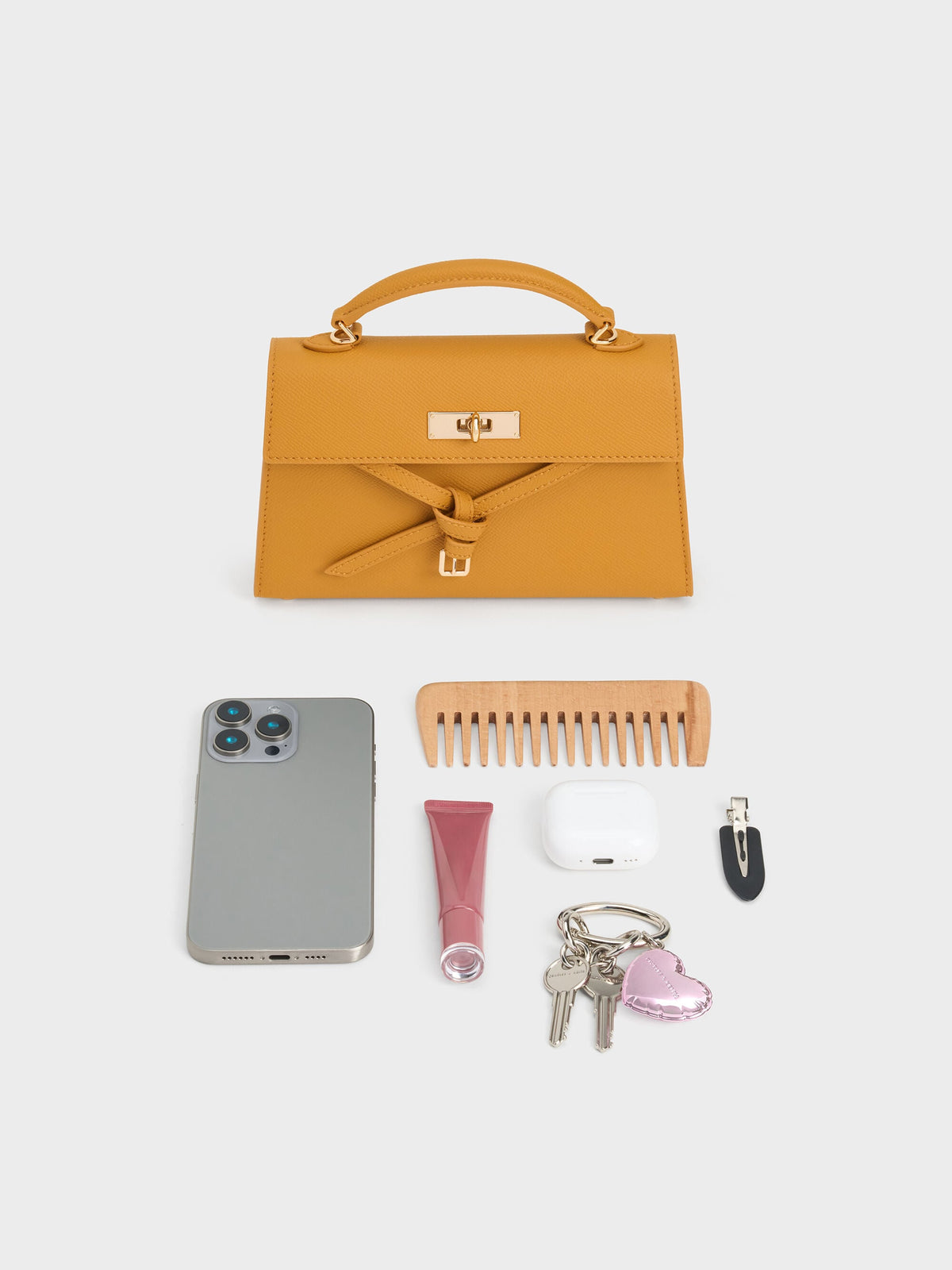 CHARLES & KEITH Signature | Tricha Knotted-Belt Top Handle Bag - Saffron Yellow