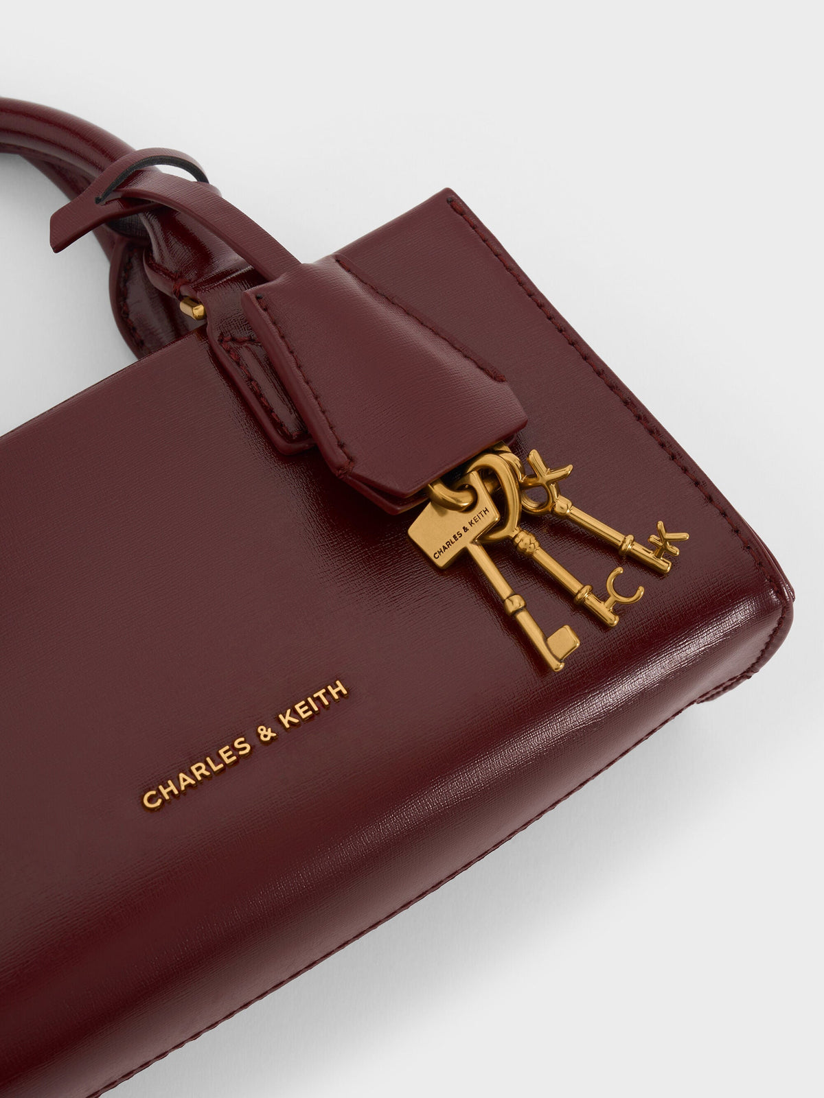 CHARLES & KEITH Premium | Mini Kerry Top Handle Bag - Wineberry Red