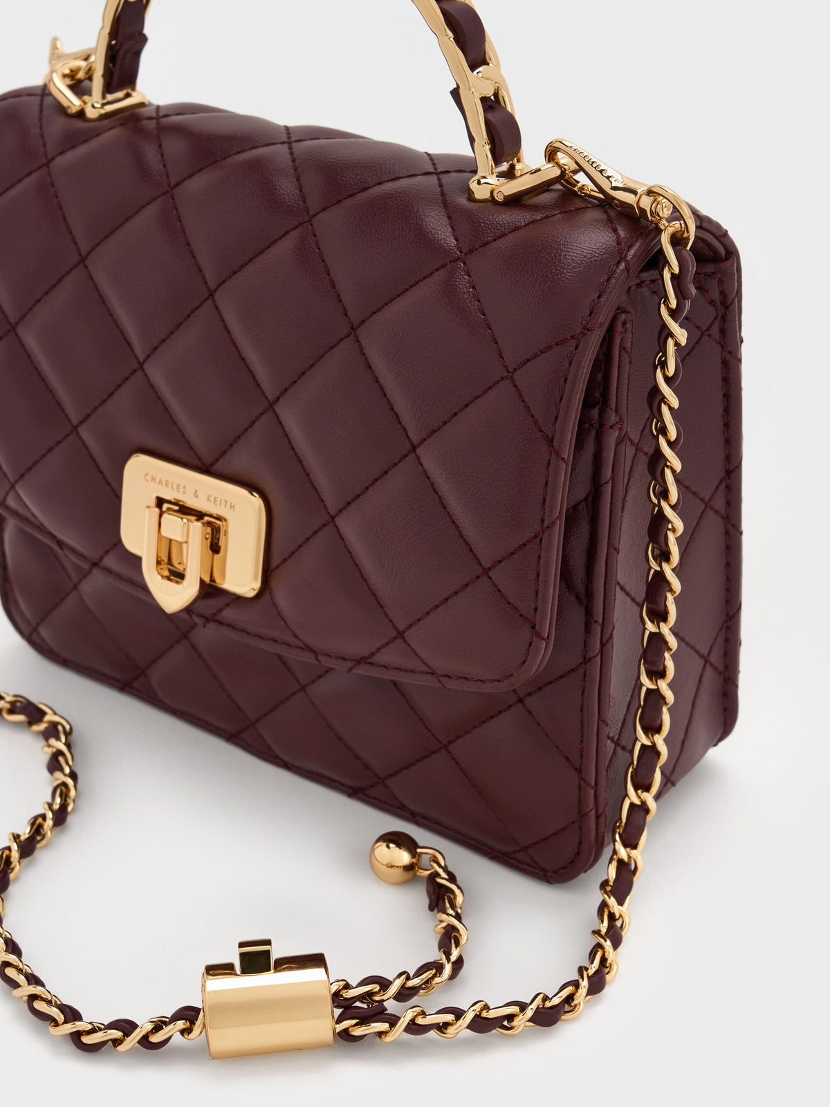 CHARLES & KEITH Featured | Cressida Quilted Top Handle Bag - Wineberry Red