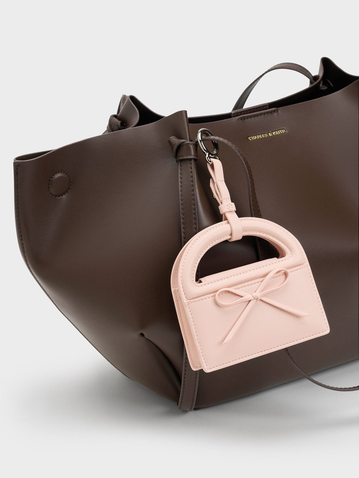 CHARLES & KEITH Special Offer | Reese Bow Top Handle Wristlet - Soft Pink