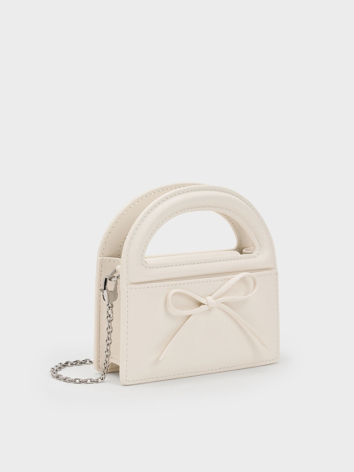 CHARLES & KEITH Latest | Reese Bow Top Handle Wristlet - Cream