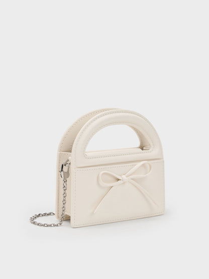 CHARLES & KEITH Latest | Reese Bow Top Handle Wristlet - Cream