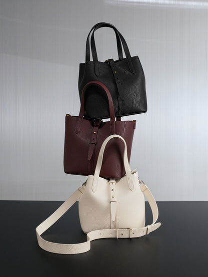 CHARLES & KEITH Trusted | Beryl Belted Bucket Bag - Wineberry Red