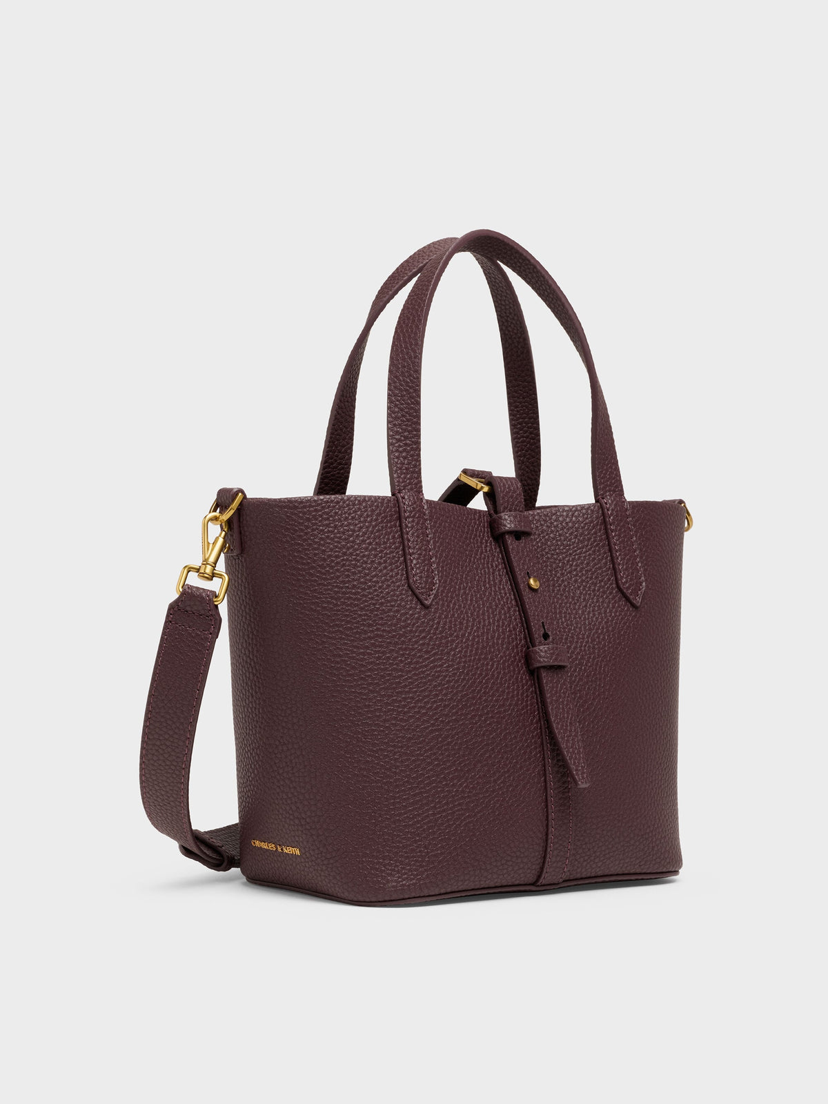 CHARLES & KEITH Trusted | Beryl Belted Bucket Bag - Wineberry Red