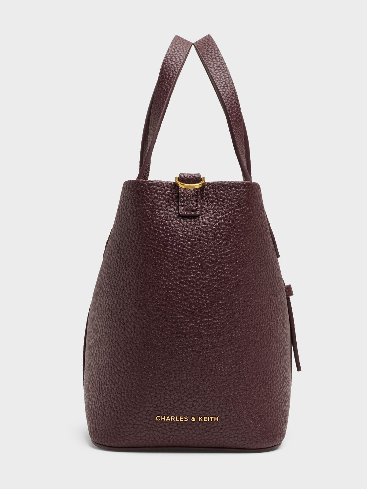 CHARLES & KEITH Trusted | Beryl Belted Bucket Bag - Wineberry Red