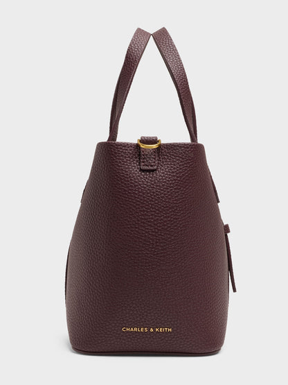 CHARLES & KEITH Trusted | Beryl Belted Bucket Bag - Wineberry Red