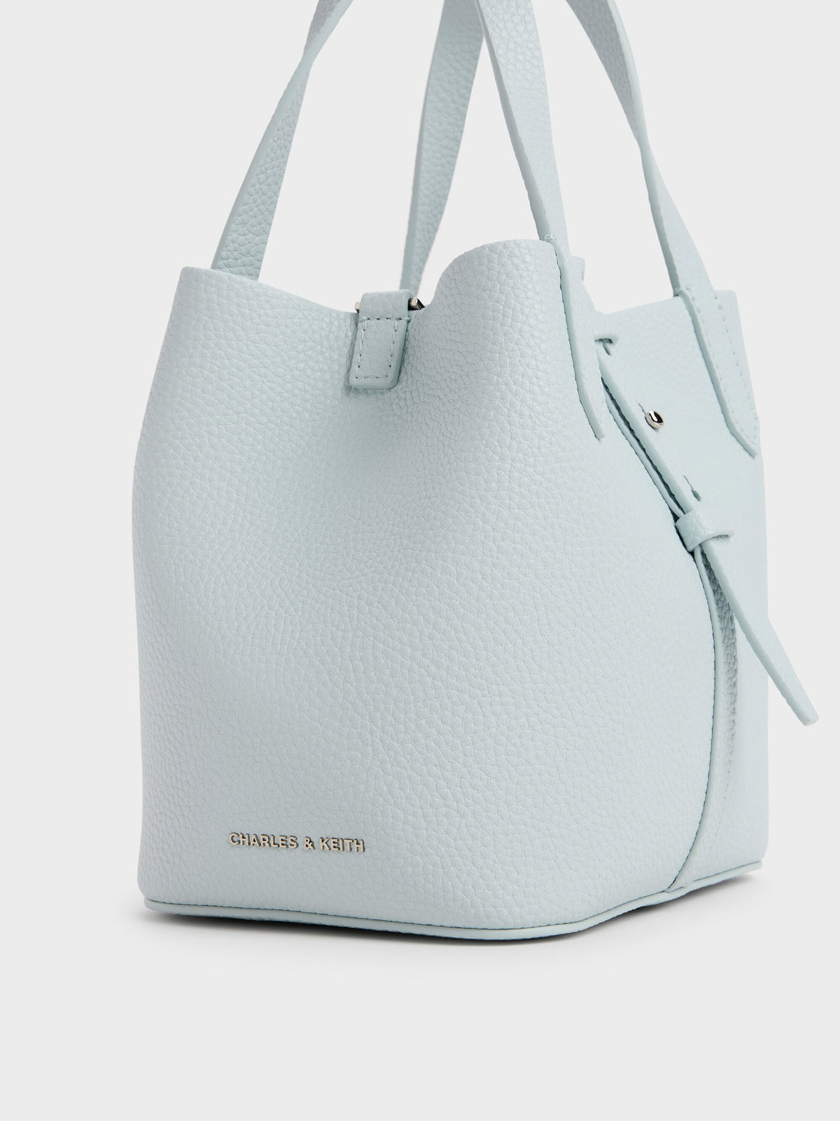 CHARLES & KEITH Deals | Beryl Belted Bucket Bag - Sea Salt Blue