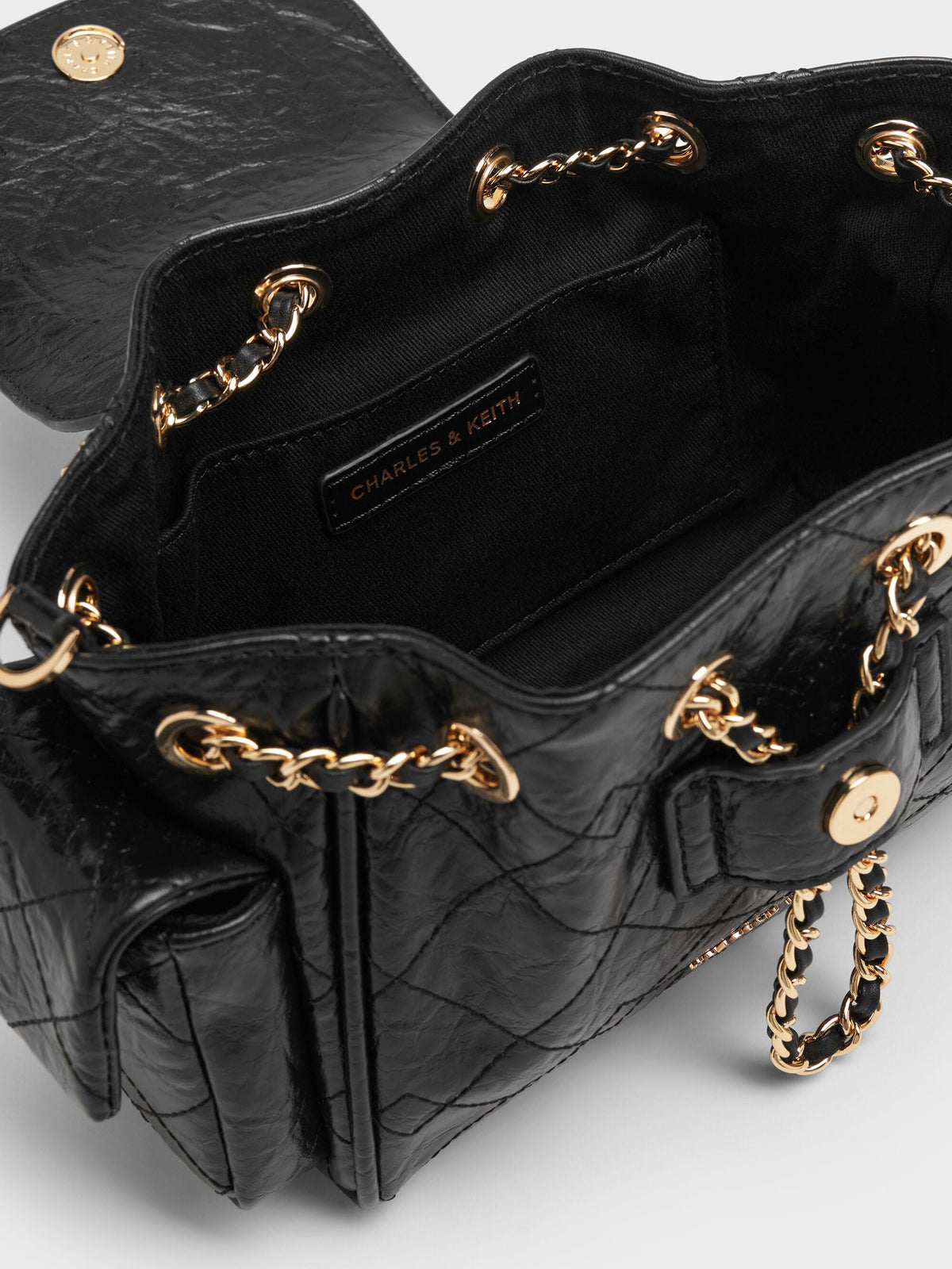 CHARLES & KEITH Sale | Duo Quilted Two-Way Front Flap Backpack - Black