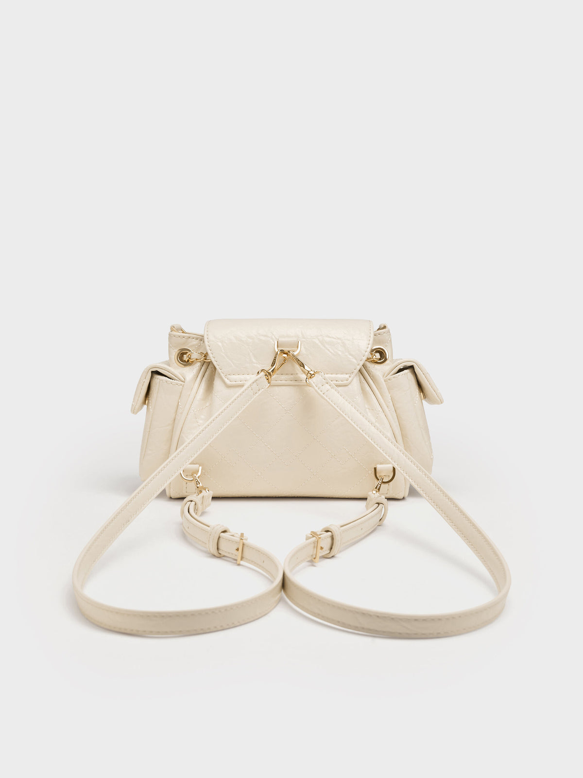 CHARLES & KEITH Smart Buy | Duo Quilted Two-Way Front Flap Backpack - Cream